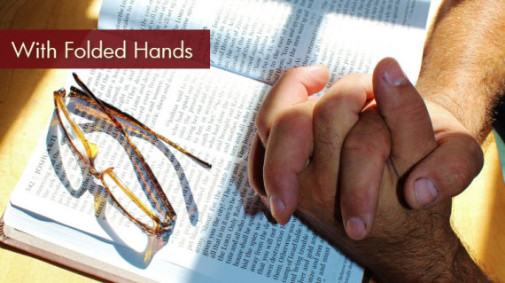 praying with folded hands